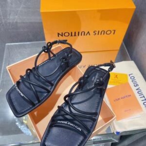 Sandali piatti Falsa Louis Vuitton Nova in pelle di agnello nera